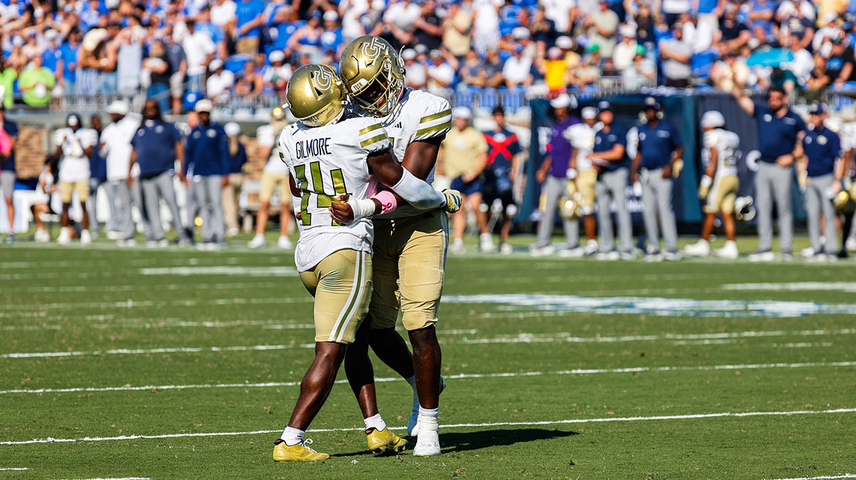 Georgia Tech Yellow Jackets linebacker Tah'J Butler (15) celebrates with defensive back Jy Gilmore (14) during the second half of the game against Duke Blue Devils at Wallace Wade Stadium.