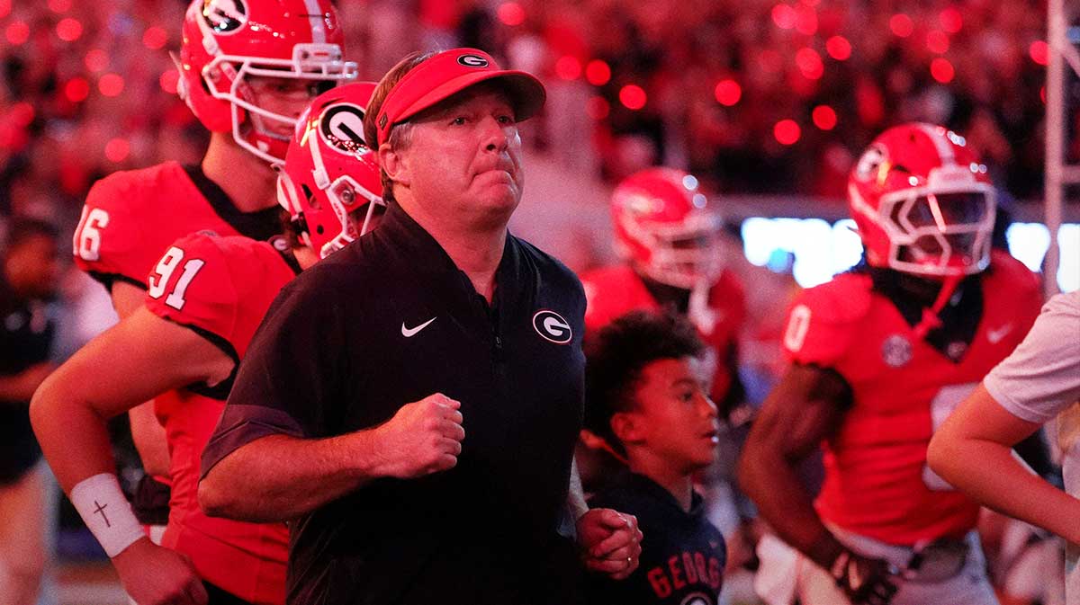 Georgia Bulldogs coach Kirby Smart takes the field before the start of a NCAA college football game against Alabama.
