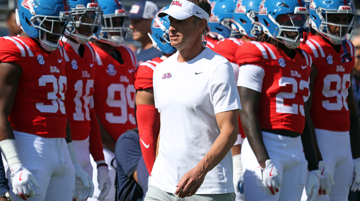 Mississippi Rebels head coach Lane Kiffin looks on during warm ups prior to the game against the Washington State Cougars at Vaught-Hemingway Stadium.