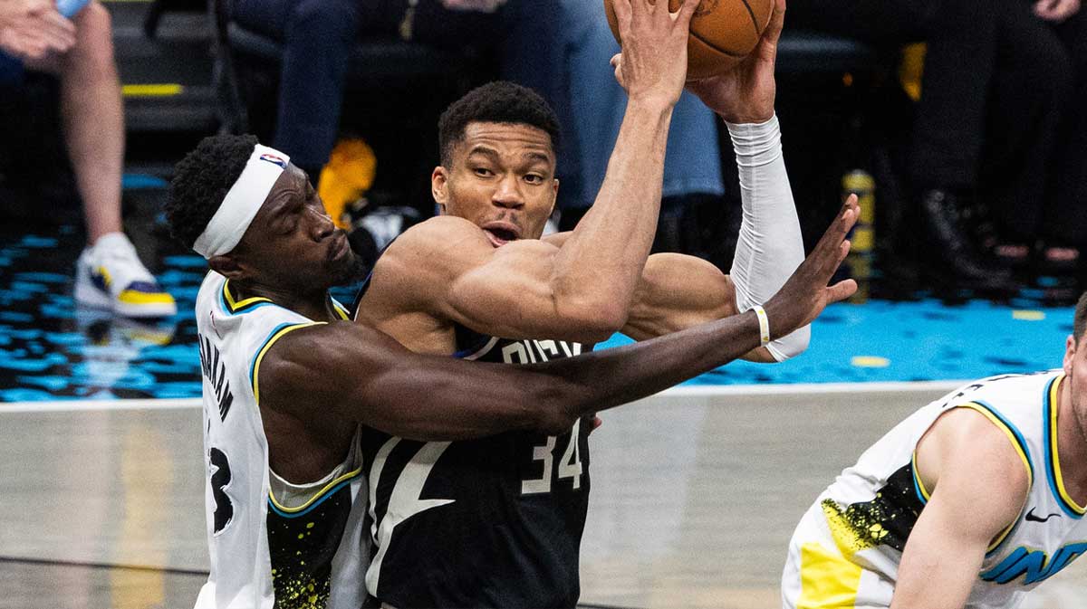 Milwaukee Bucks forward Giannis Antetokounmpo (34) shoots the ball while Indiana Pacers forward Pascal Siakam (43) defends during game five of the first round for the 2024 NBA Playoffs at Gainbridge Fieldhouse.
