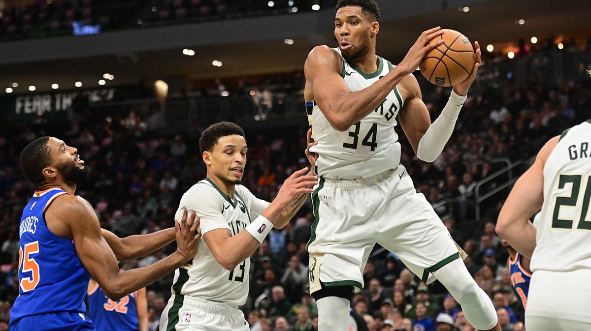 Milwaukee Bucks forward Giannis Antetokounmpo (34) grabs a rebound in the 3rd quarter against the New York Knicks at Fiserv Forum.