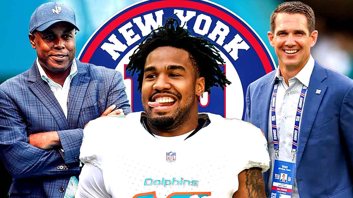 Dolphins WR Jaylen Waddle (center) with Giants GM Joe Schoen and Dolphins GM Chris Grier behind him. New York Giants logo in background