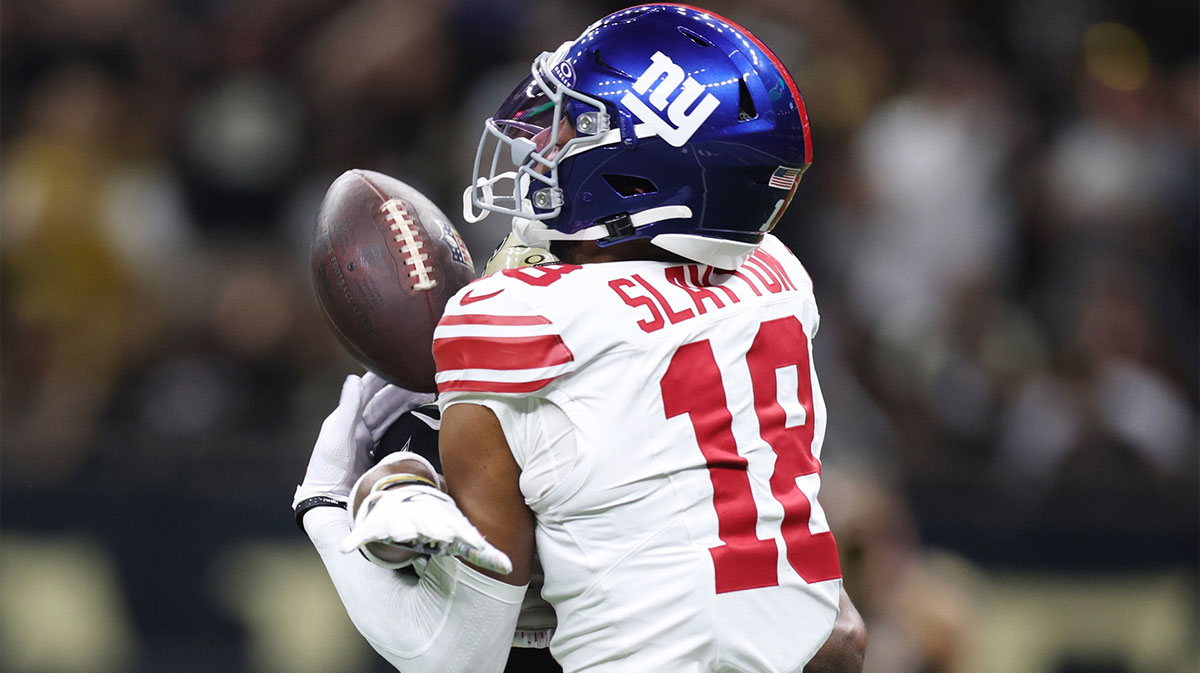 New York Giants wide receiver Darius Slayton (18) reaches for the ball against New Orleans Saints cornerback Isaac Yiadom (26) during the first half at Caesars Superdome.