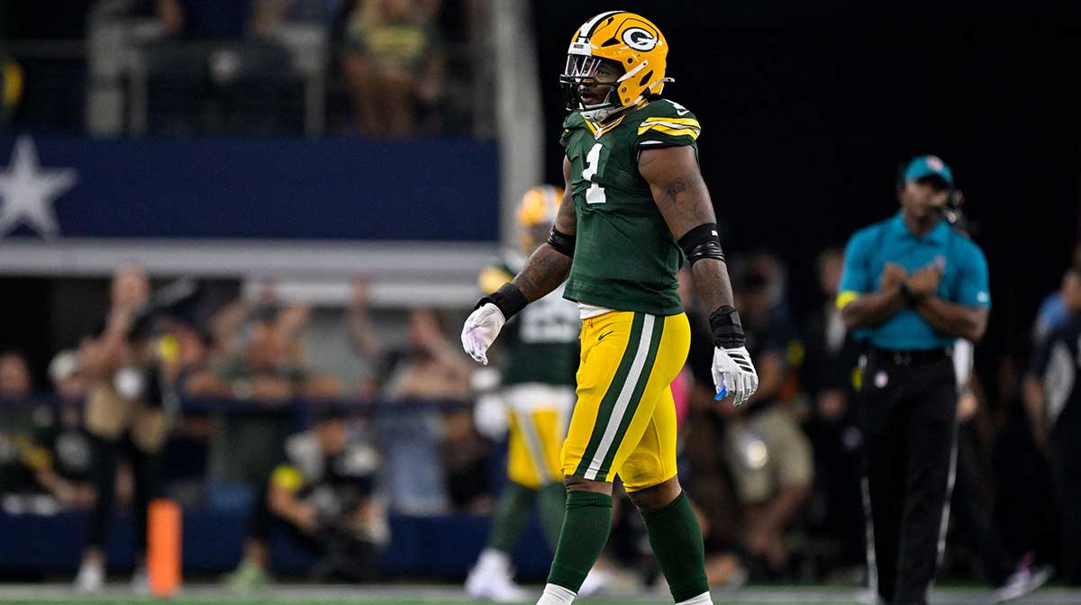 Green Bay Packers defensive end Micah Parsons (1) walks off the field