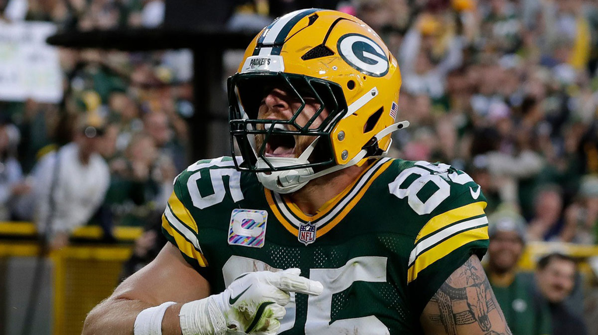 Green Bay Packers tight end Tucker Kraft (85) celebrates a touchdown during a game against the Cincinnati Bengals