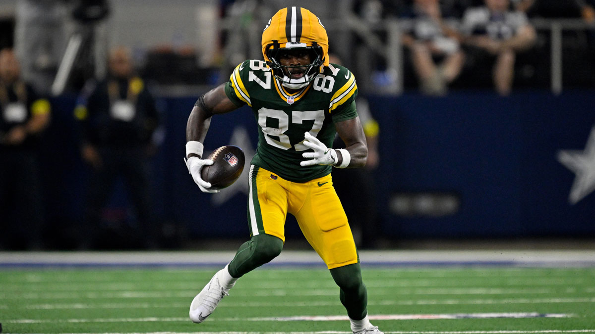 Green Bay Packers wide receiver Romeo Doubs (87) runs with the ball during the game between the Dallas Cowboys