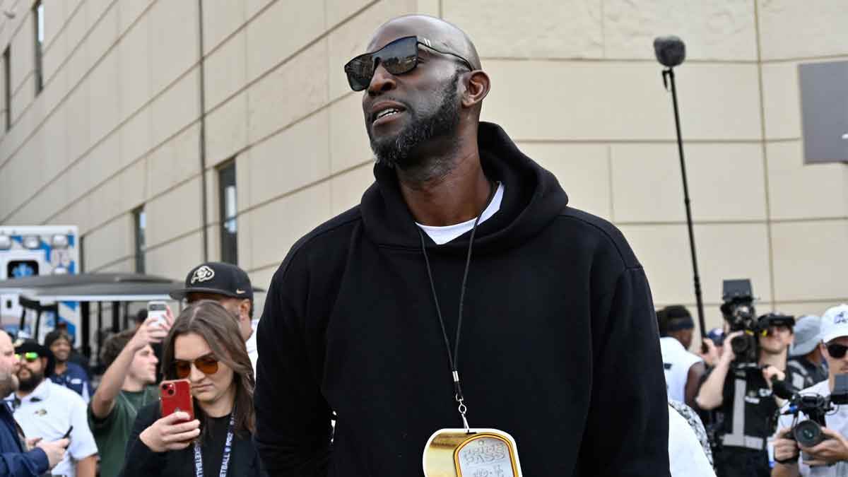Kevin Garnett on hand for the Colorado Buffaloes USC Trojans football game at Folsom Field with Pablo Torre in the background