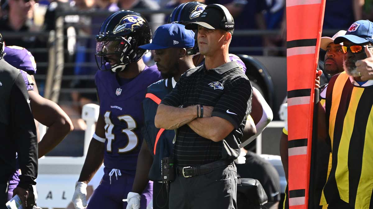 Baltimore Ravens head coach John Harbaugh stands on the sidelines during the third quarter against the Houston Texans at M&T Bank Stadium.