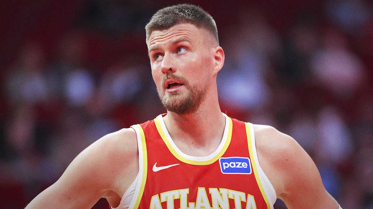 Atlanta Hawks forward/center Kristaps Porzingis (8) reacts during the second quarter against the Houston Rockets at Toyota Center.