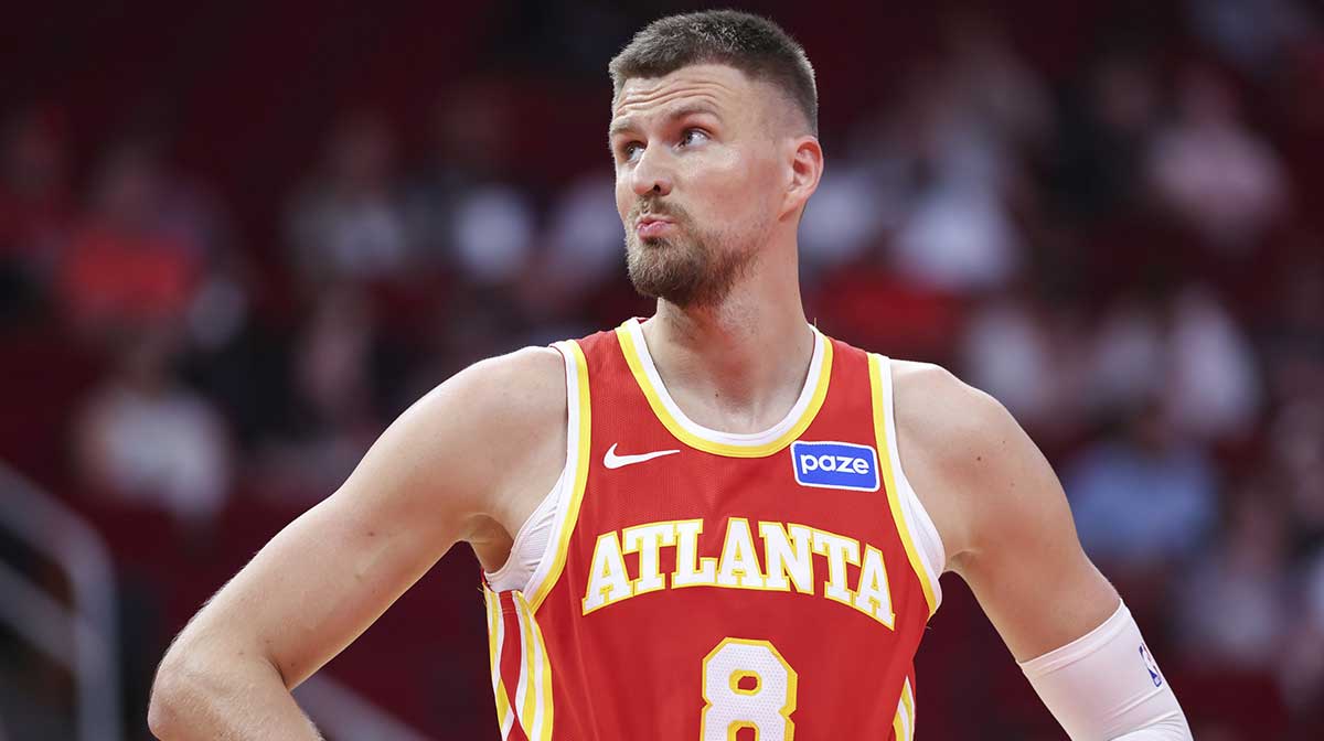 Atlanta Hawks forward/center Kristaps Porzingis (8) reacts during the second quarter against the Houston Rockets at Toyota Center.