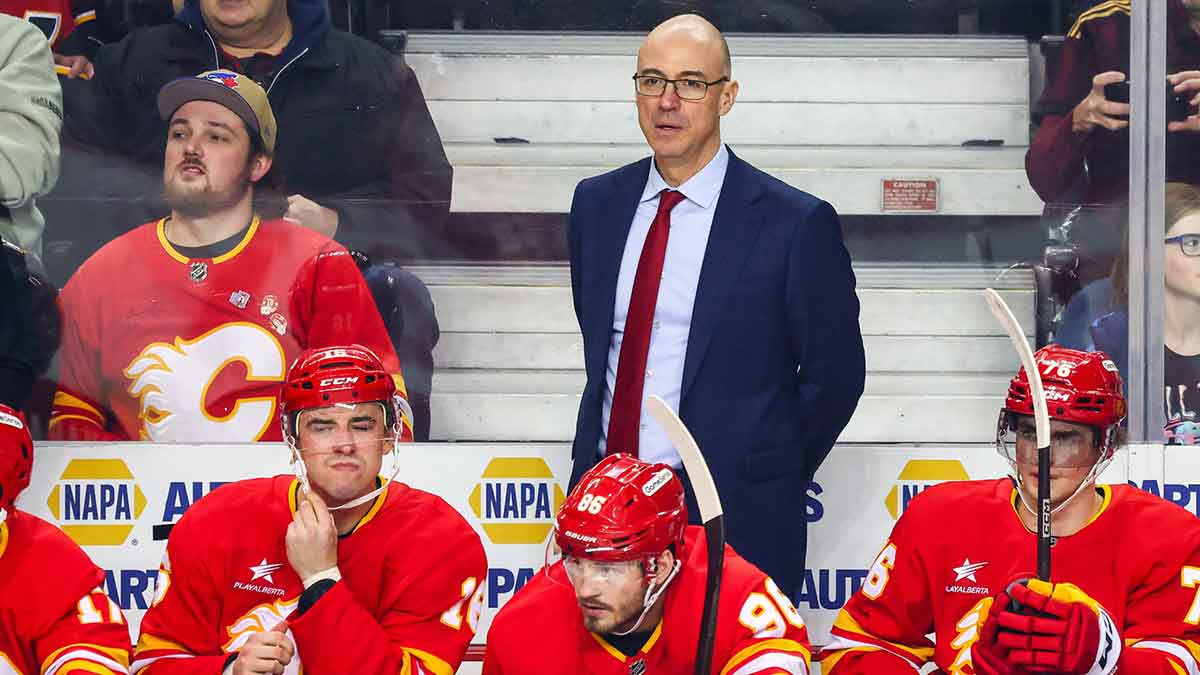 Flames lock up head coach for 2 more years