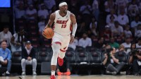 Miami Heat center Bam Adebayo (13) dribbles the basketball against the Cleveland Cavaliers in the third quarter during game three for the first round of the 2025 NBA Playoffs at Kaseya Center.