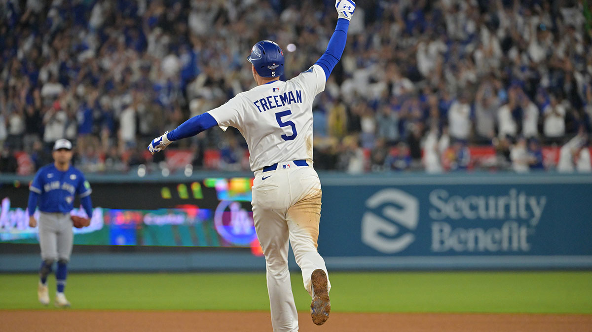 Los Angeles Dodgers first baseman Freddie Freeman (5) celebrates as he runs the bases after hitting a walk off home run against the Toronto Blue Jays in the eighteenth inning during game three of the 2025 MLB World Series at Dodger Stadium. Mandatory Credit: Jayne Kamin-Oncea-Imagn Images