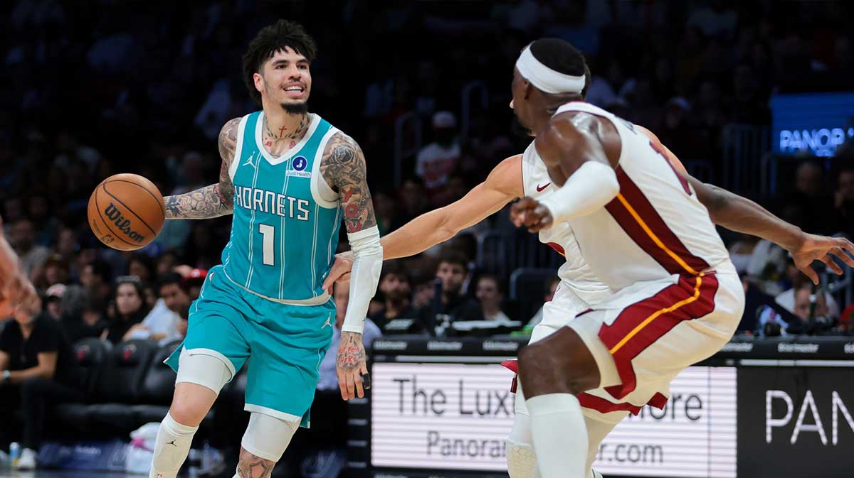 Watch Hornets’ LaMelo Ball accidentally kick ball into Heat player’s face
