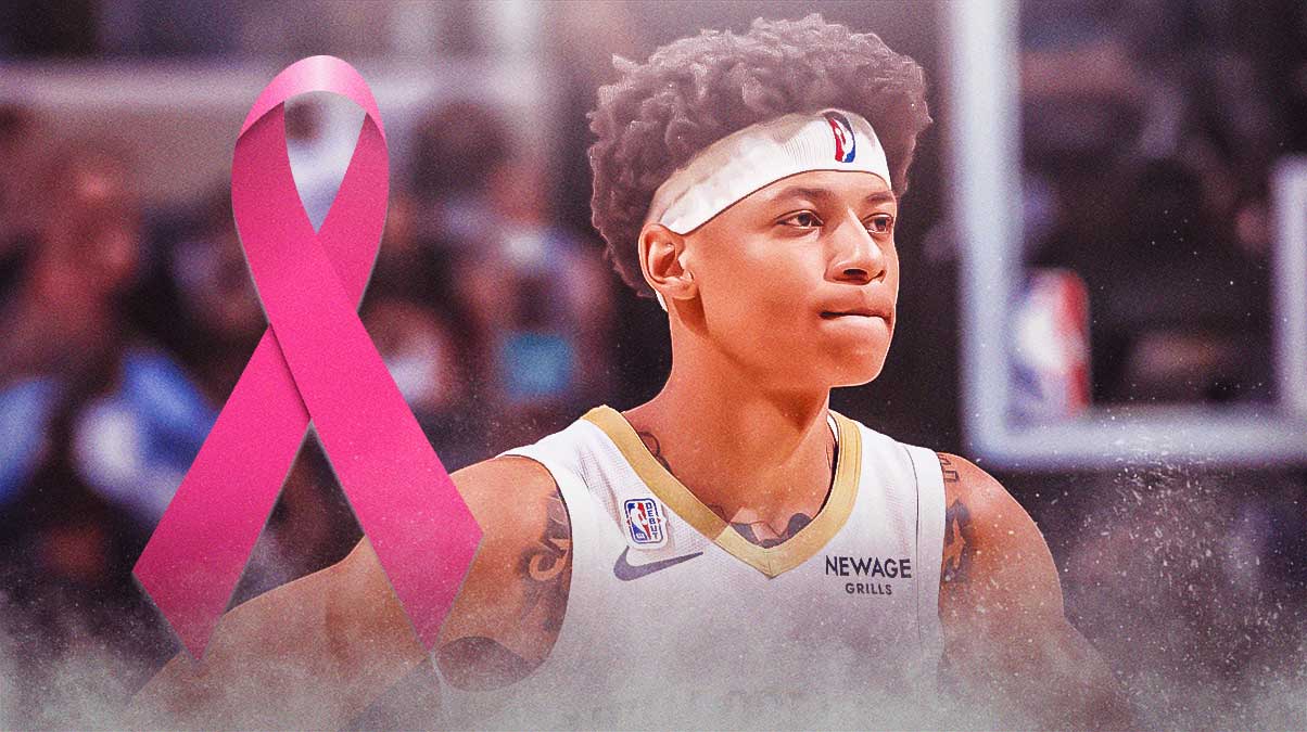 Jeremiah Fears, Smoothie King Center (background), pink Breast Cancer Awareness ribbon
