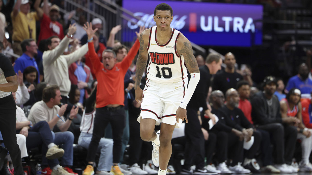 Houston Rockets forward Jabari Smith Jr. (10) reacts after making a basket during overtime against the Philadelphia 76ers at Toyota Center.