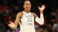 Las Vegas Aces center A'ja Wilson (22) reacts against the Phoenix Mercury in the second half during game three of the 2025 WNBA Finals at PHX Arena.