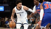 Memphis Grizzlies guard Scotty Pippen Jr. (1) dribbles as Detroit Pistons guard Javonte Green (31) defends during the fourth quarter at FedExForum.