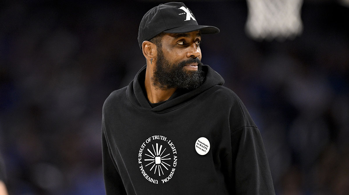 Dallas Mavericks guard Kyrie Irving (11) walks on the court during the second half against the Oklahoma City Thunder at Dickie's Arena.