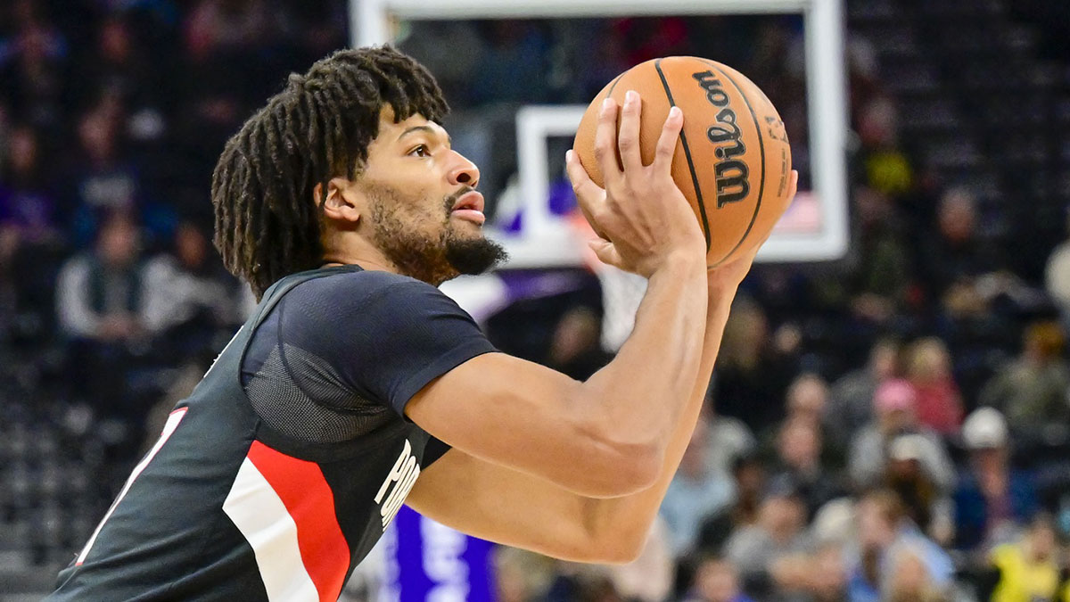 Portland Trail Blazers guard Shaedon Sharpe (17) makes a three point shot against the Utah Jazz during the first half at Delta Center.