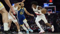 Portland Trail Blazers guard Javonte Cooke (18) drives to the basket during the second half against Golden State Warriors forward Jackson Rowe (44) at Moda Center.