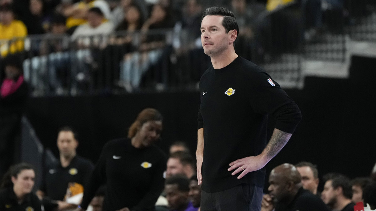 Los Angeles Lakers head coach JJ Redick watches from the bench during the first half against the Dallas Mavericks at T-Mobile Arena.