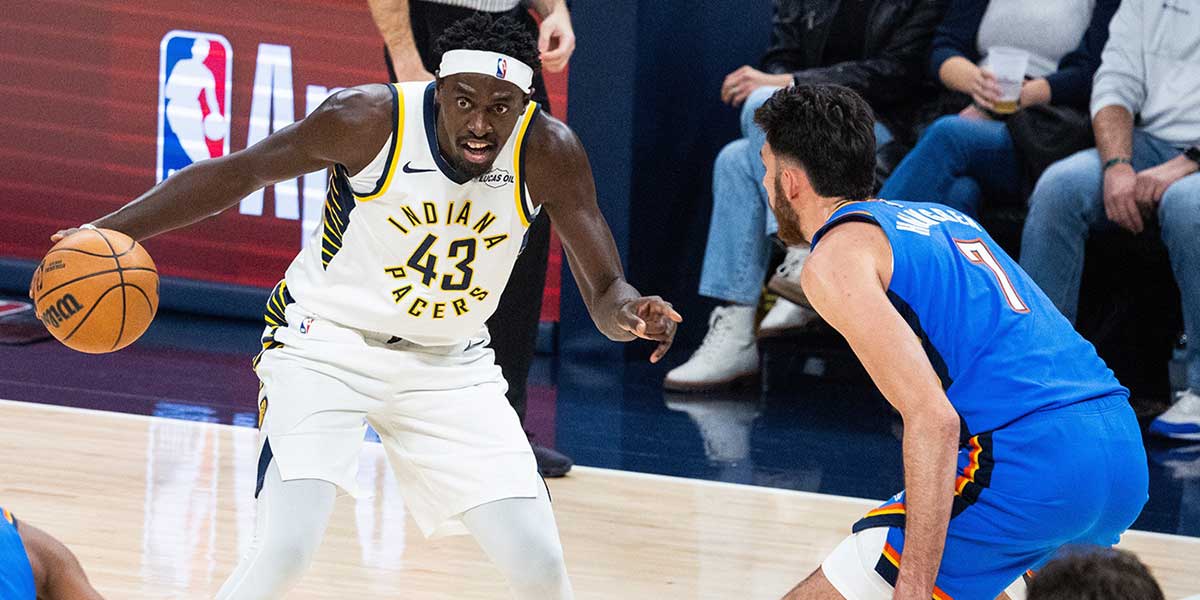 Indiana Pacers forward Pascal Siakam (43) dribbles the ball while Oklahoma City Thunder center Chet Holmgren (7) defends in the first half at Gainbridge Fieldhouse.