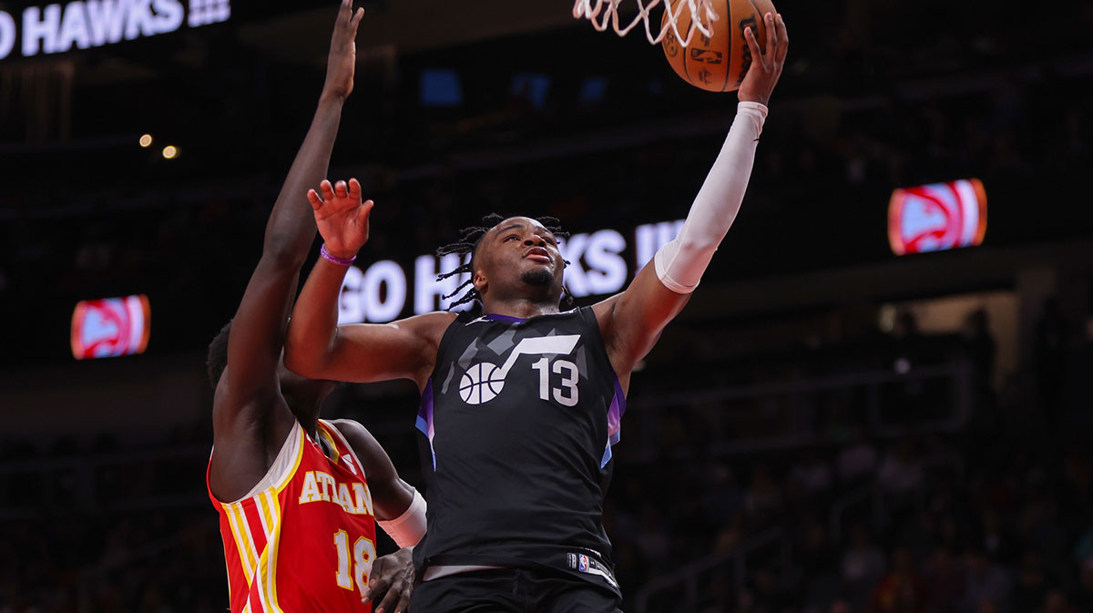 Utah Jazz guard Isaiah Collier (13) shoots against the Atlanta Hawks in the third quarter at State Farm Arena.
