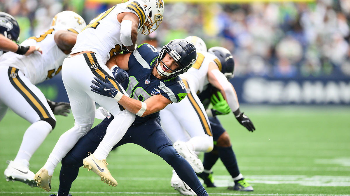Seattle Seahawks wide receiver Cooper Kupp (10) blocks New Orleans Saints safety Justin Reid (21) during the first quarter at Lumen Field.