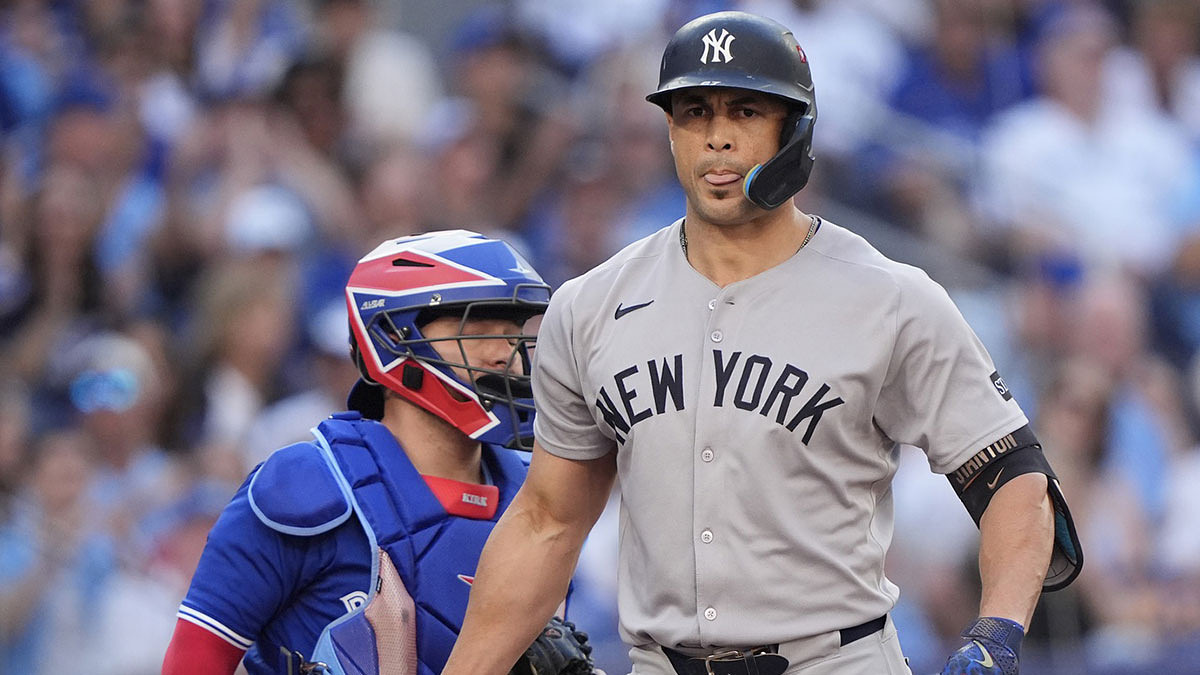 New York Yankees designated hitter Giancarlo Stanton (27) reacts after striking out to Trey Yesavage in the second inning against the Toronto Blue Jays
