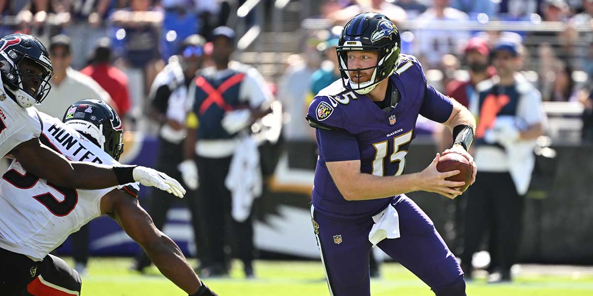 Baltimore Ravens quarterback Cooper Rush (15) moves in the pocket during the second quarter against the Houston Texans