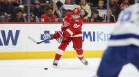 Detroit Red Wings right wing Patrick Kane (88) shoots the puck during the second period against the Tampa Bay Lightning at Little Caesars Arena.