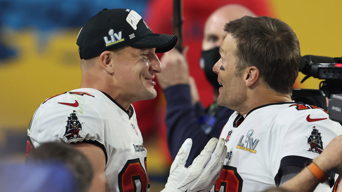 Tampa Bay Buccaneers quarterback Tom Brady (12) and tight end Rob Gronkowski (87) celebrate after defeating the Kansas City Chiefs in Super Bowl LV at Raymond James Stadium.
