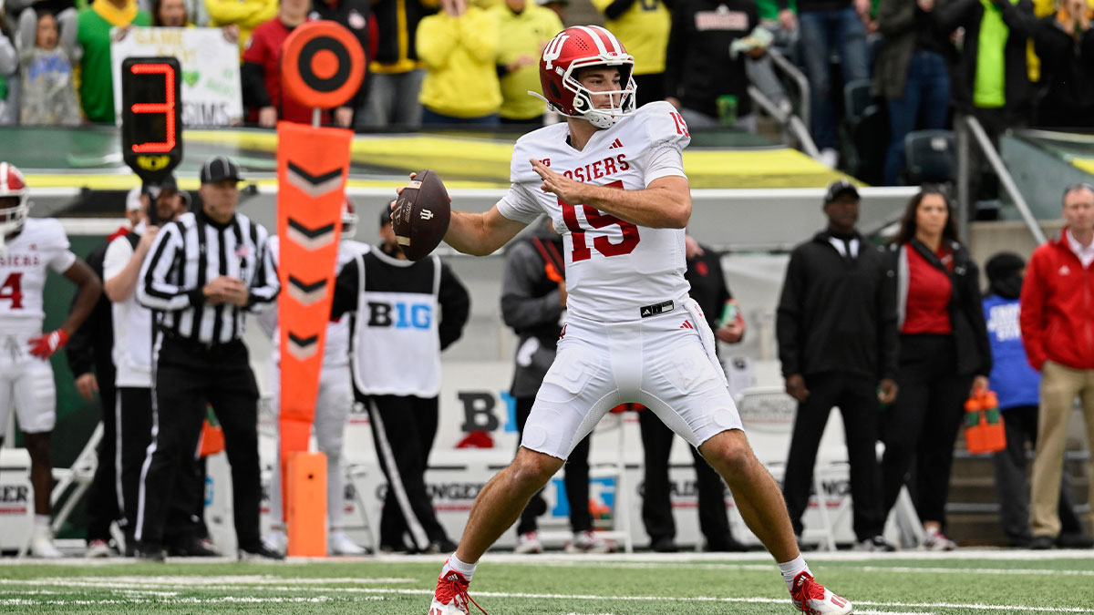 Indiana Hoosiers quarterback Fernando Mendoza (15) throws a pass against the Oregon Ducks during the second quarter at Autzen Stadium.