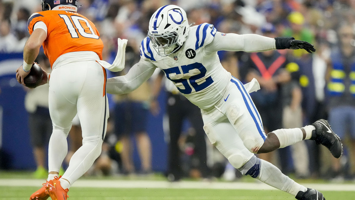 Indianapolis Colts defensive end Samson Ebukam (52) moves in on Denver Broncos quarterback Bo Nix (10 at Lucas Oil Stadium.