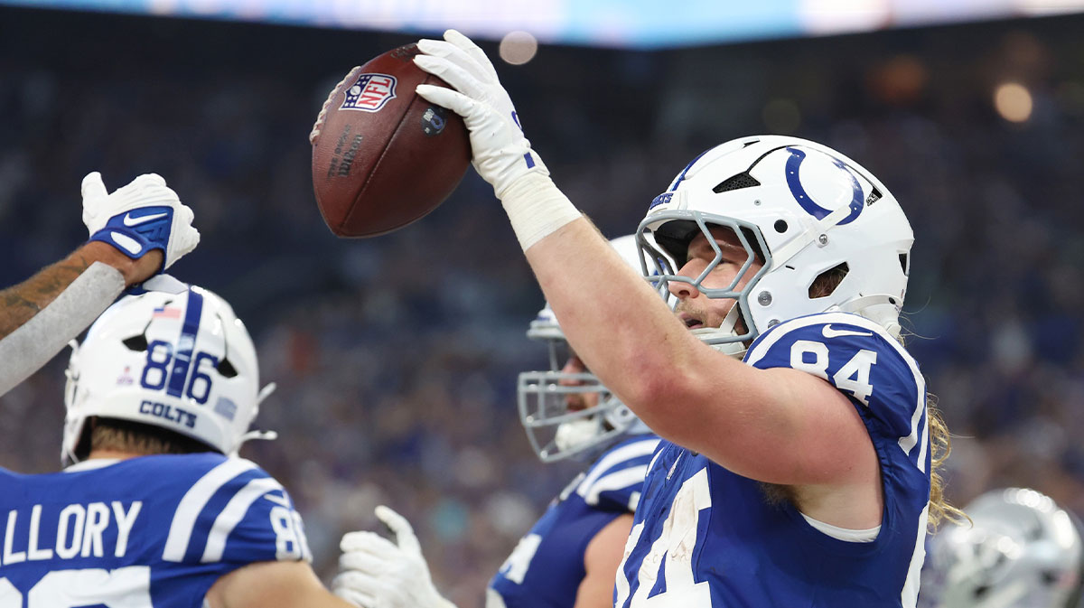 Indianapolis Colts tight end Tyler Warren (84) celebrates after scoring a touchdown against the Las Vegas Raiders during the first quarter at Lucas Oil Stadium.