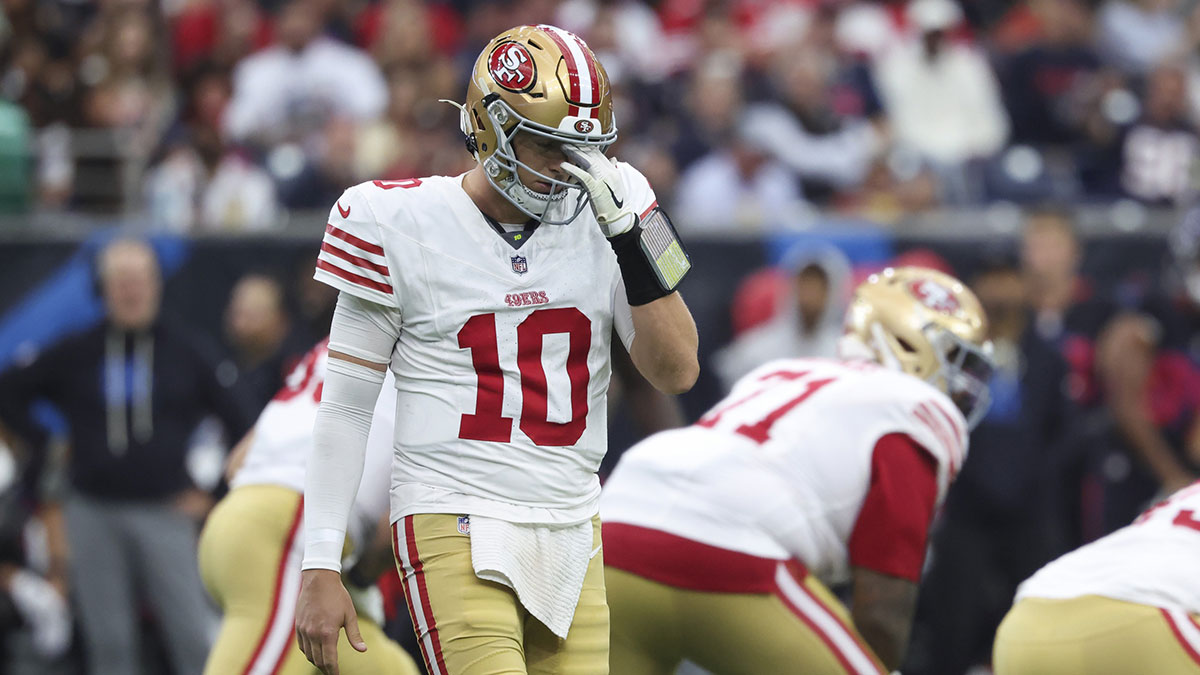 San Francisco 49ers quarterback Mac Jones (10) walks off the field during the third quarter against the Houston Texans at NRG Stadium.