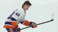 New York Islanders defenseman Matthew Schaefer (48) skates his rookie lap before making his NHL debut against the Pittsburgh Penguins at PPG Paints Arena.