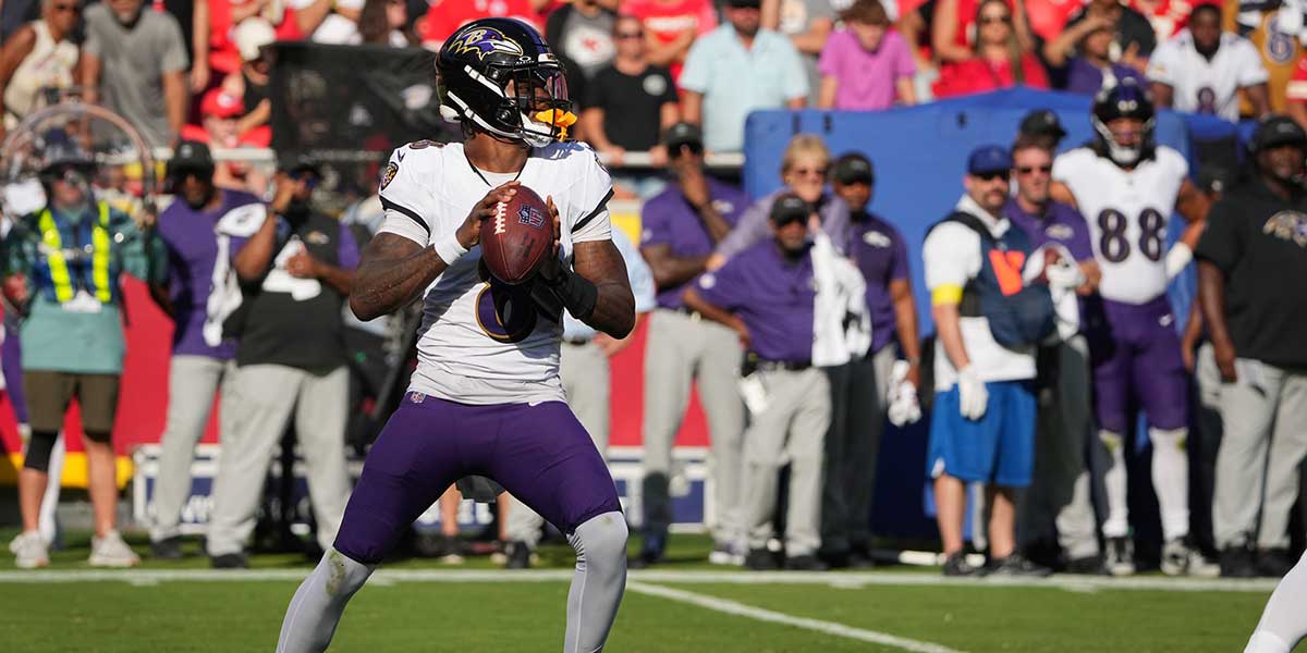 Sep 28, 2025; Kansas City, Missouri, USA; Baltimore Ravens quarterback Lamar Jackson (8) drops back to pass during the first half against the Kansas City Chiefs at GEHA Field at Arrowhead Stadium. 