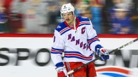 New York Rangers center J.T. Miller (8) skates during the warmup period against the Calgary Flames at Scotiabank Saddledome.