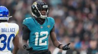 Jacksonville Jaguars wide receiver Travis Hunter (12) reacts after a play against the Los Angeles Rams during the second half of an NFL International Series game at Wembley Stadium.