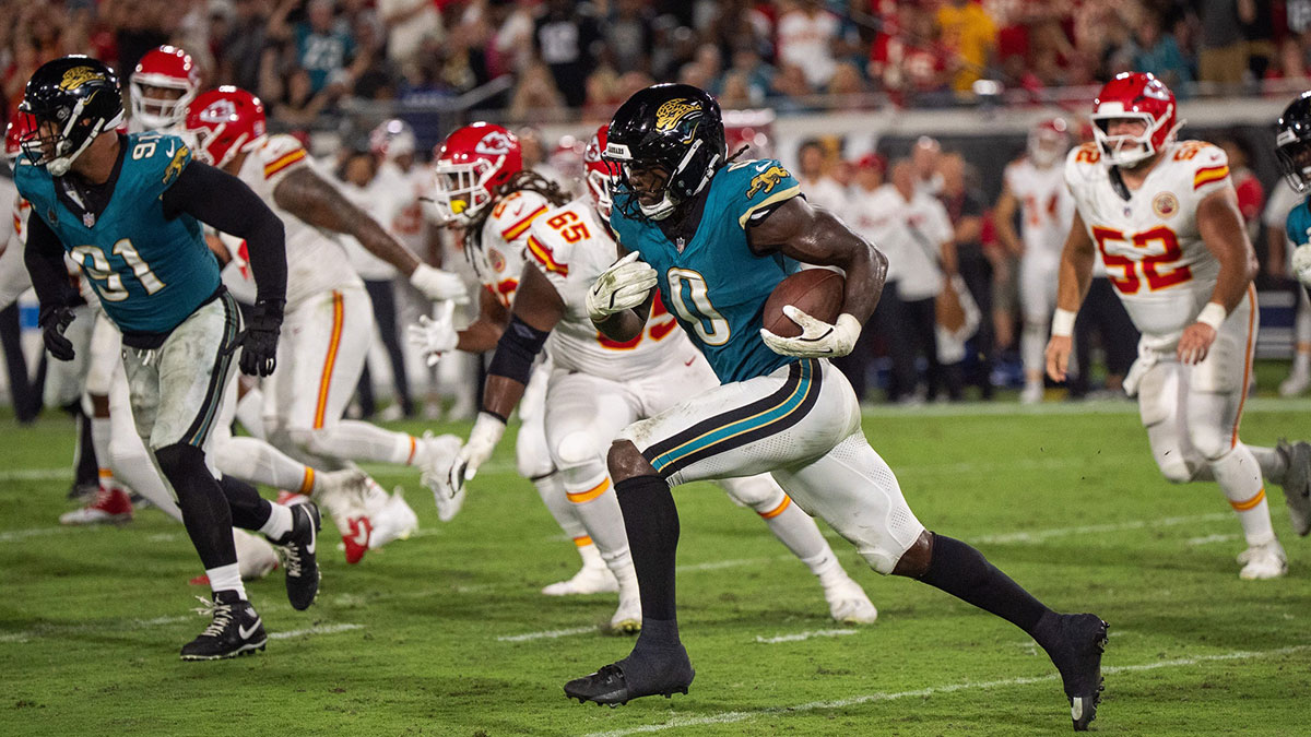 Jacksonville Jaguars linebacker Devin Lloyd (0) runs back an interception for a pick six in the third quarter during a Monday Night NFL football game at EverBank Stadium, Monday, Oct. 6, 2025, in Jacksonville, Fla. [Doug EngleFlorida Times-Union]