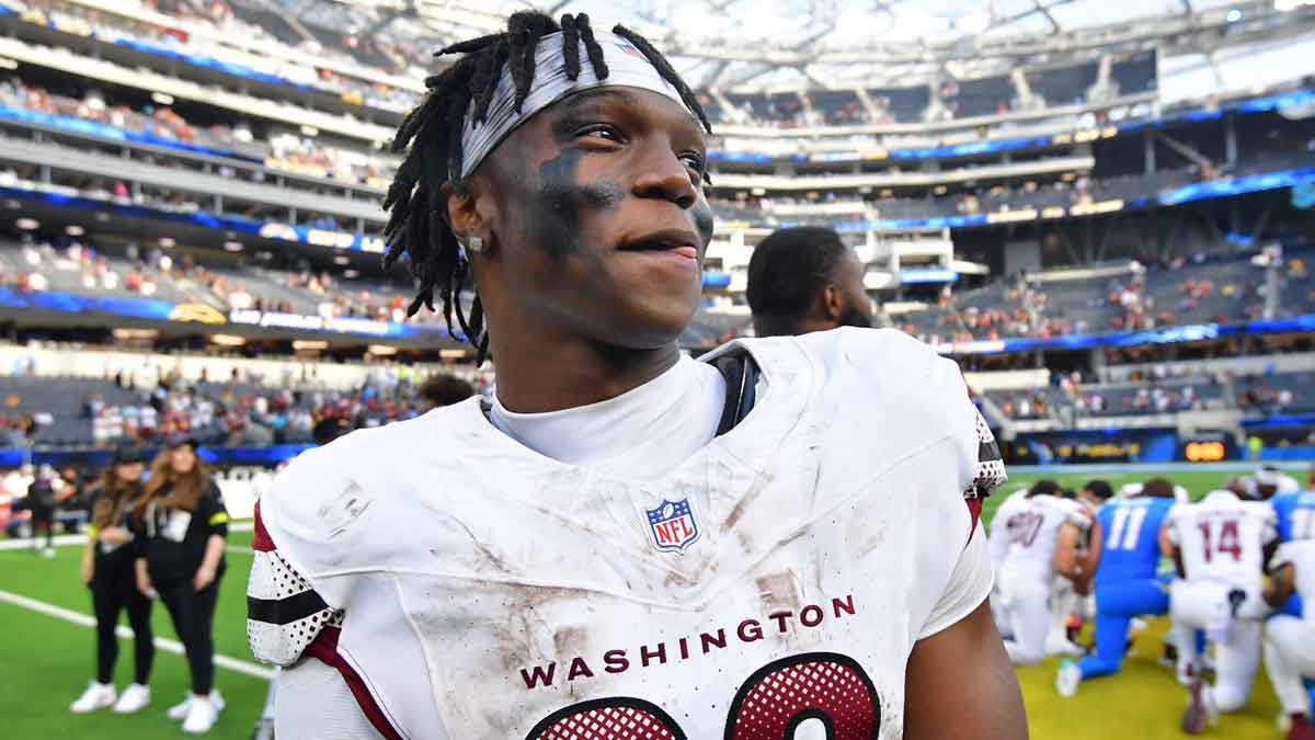 Washington Commanders running back Jacory Croskey-Merritt (22) celebrates after the game against the Los Angeles Chargers at SoFi Stadium.