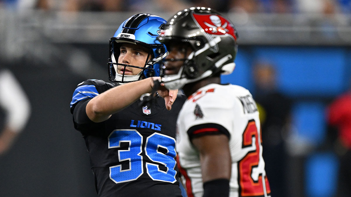 Detroit Lions kicker Jake Bates (39) kicks a field goal against the Tampa Bay Buccaneers during the first half at Ford Field.