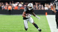 Las Vegas Raiders wide receiver Jakobi Meyers (16) runs the ball during the second half against the Chicago Bears at Allegiant Stadium.