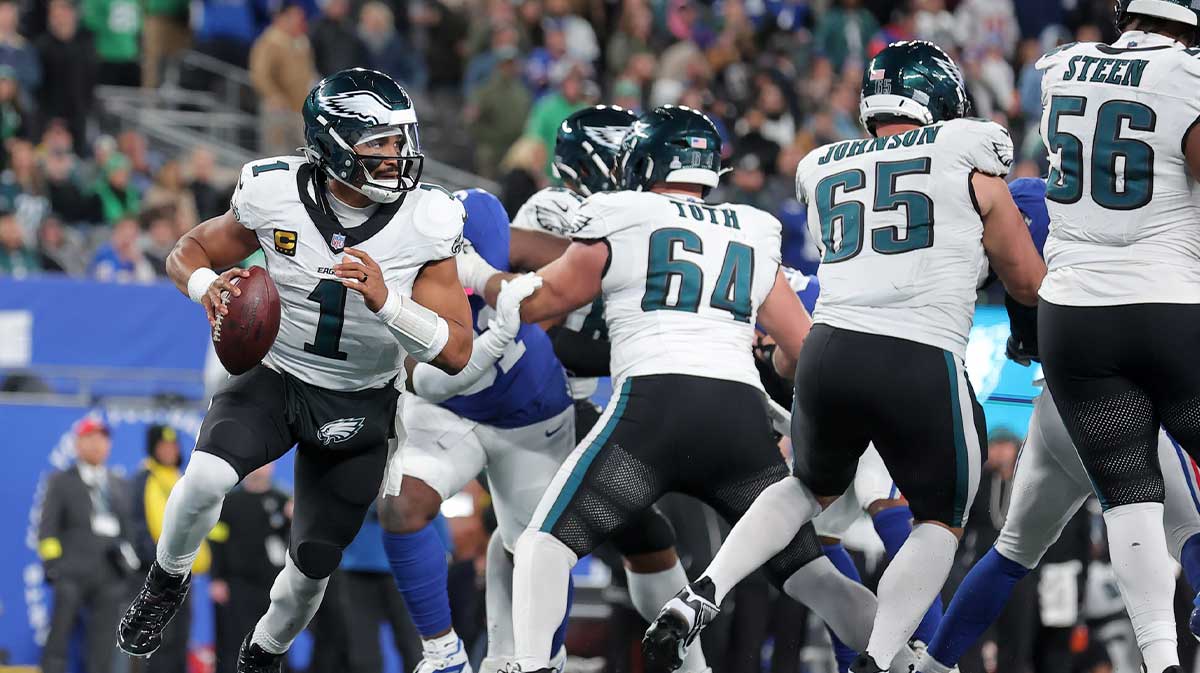 Philadelphia Eagles quarterback Jalen Hurts (1) looks to pass against the New York Giants during the fourth quarter of the game at MetLife Stadium.