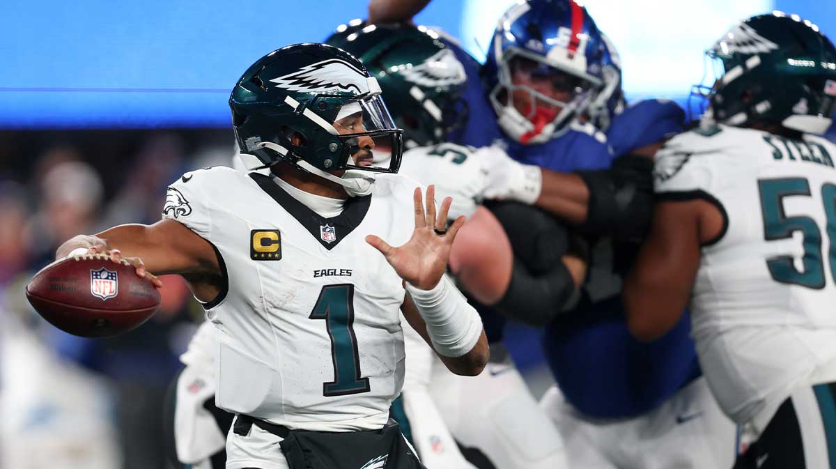 Philadelphia Eagles quarterback Jalen Hurts (1) passes the ball against the New York Giants during the second quarter of the game at MetLife Stadium.