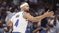 Orlando Magic guard Jalen Suggs (4) reacts after a basket against the Miami Heat in the fourth quarter at Kia Center.