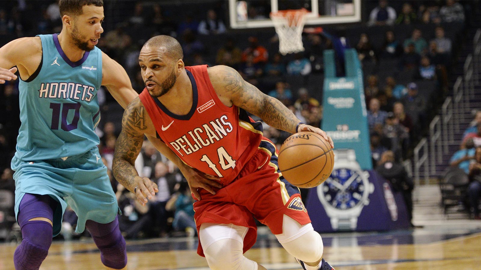 New Orleans Pelicans guard Jameer Nelson (14) drives past Charlotte Hornets guard Michael Carter-Williams (10) during the first half at Spectrum Center.