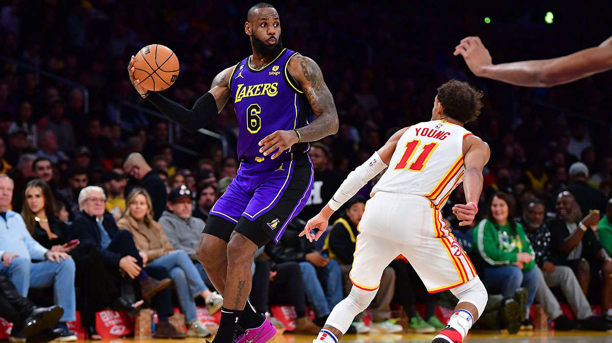 Los Angeles Lakers forward LeBron James (6) controls the ball against Atlanta Hawks guard Trae Young (11) during the second half at Crypto.com Arena.
